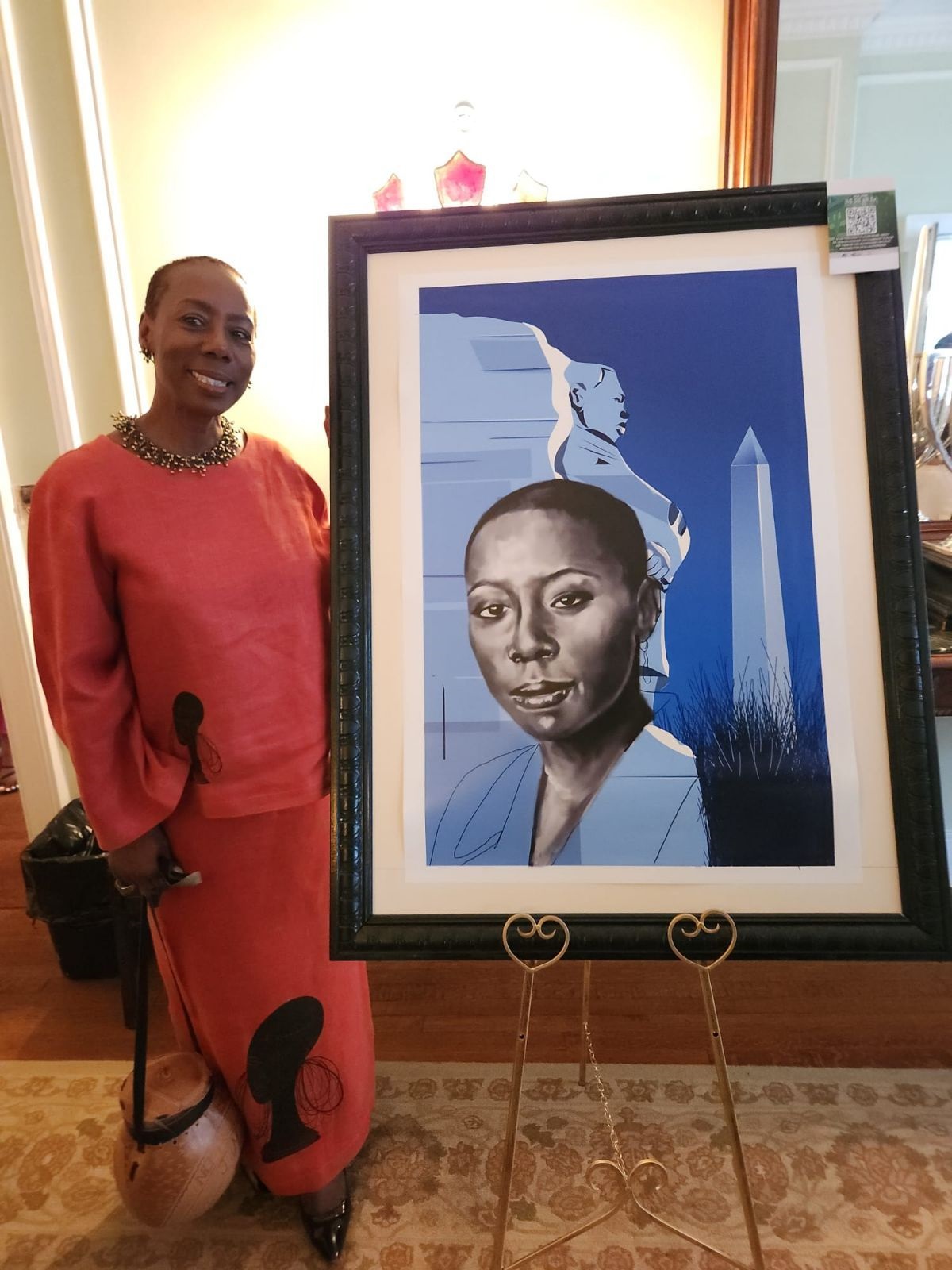Dr. Downer with presented art piece